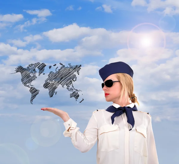 Stewardess holding world map — Stock Photo, Image