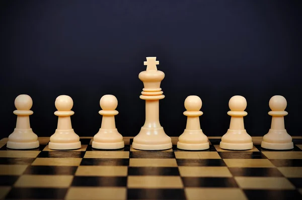 Chess King and pawns — Stock Photo, Image