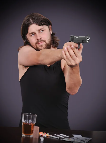 Střelec střílí z pistole — Stock fotografie