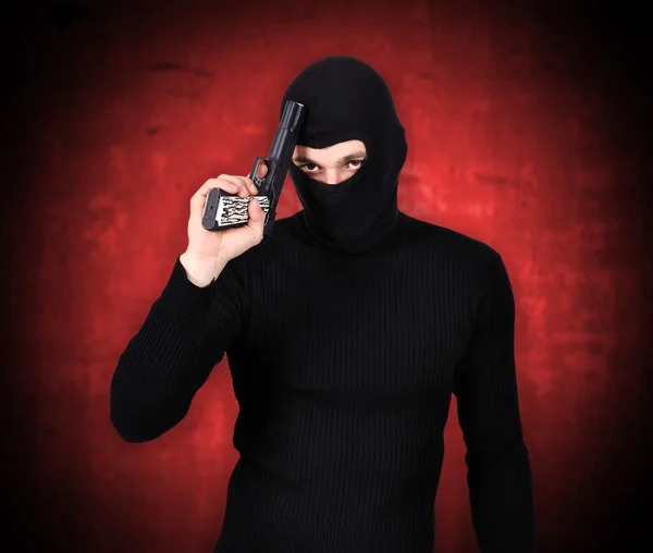 Terrorist with gun — Stock Photo, Image