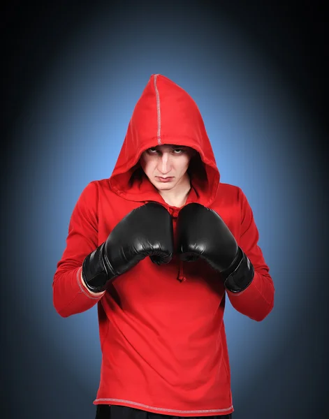 Boxeador en guantes negros —  Fotos de Stock