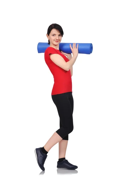 Woman with mat for fitness — Stock Photo, Image