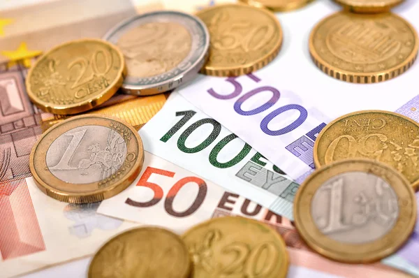 Euro bill and coins — Stock Photo, Image