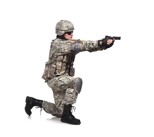Soldado dispara uma arma — Fotografia de Stock