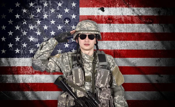 Soldier salutes — Stock Photo, Image