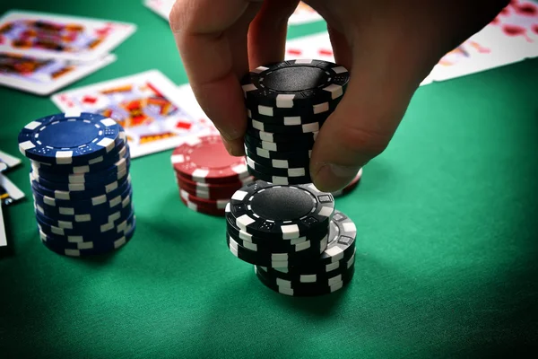 Dealer collects poker chips — Stock Photo, Image