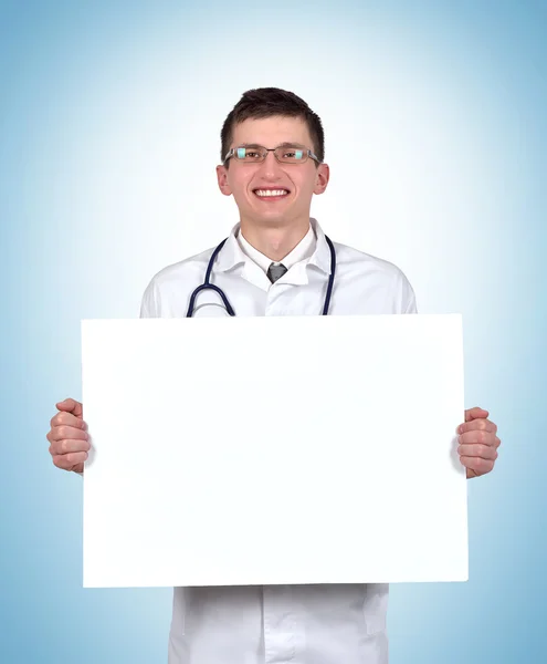 Läkare håller Tom plakat — Stockfoto