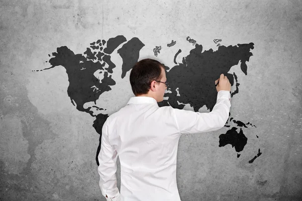 Man drawing world map — Stock Photo, Image