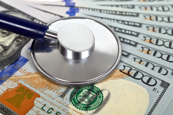 Stethoscope and dollar — Stock Photo, Image