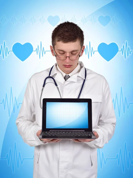 Doctor holding laptop — Stock Photo, Image