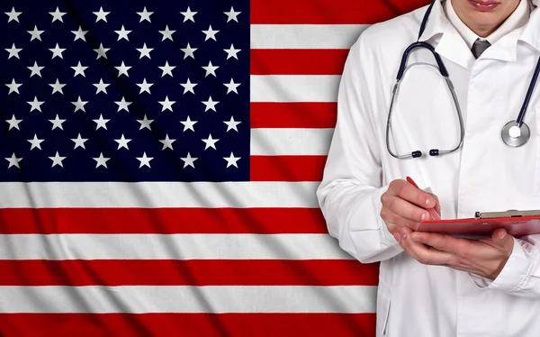 Doctor and USA  flag — Stok fotoğraf