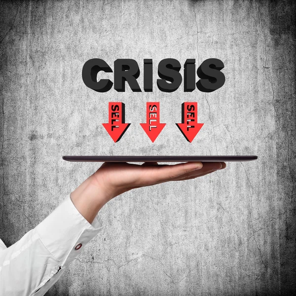 Hand holding tablet with crisis — Stock Photo, Image