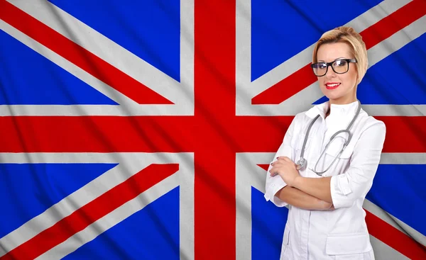 Female and britain flag — Stock Photo, Image