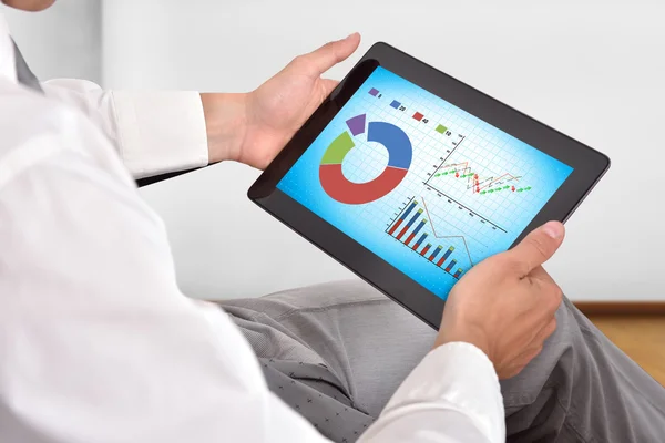 Touch pad with stock chart — Stock Photo, Image