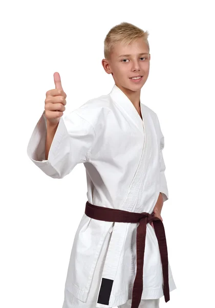 Karate jongen tonen duim omhoog — Stockfoto