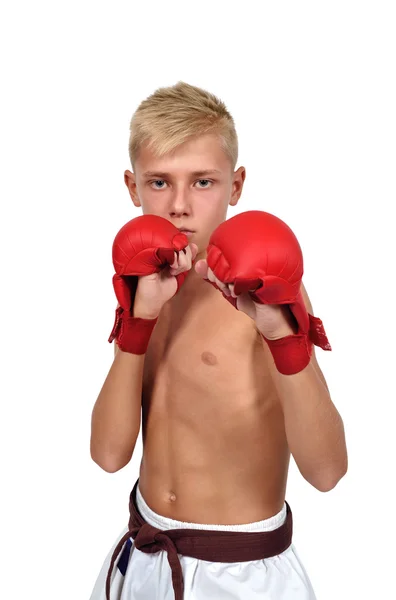 Karate chłopca w czerwonej rękawice — Zdjęcie stockowe