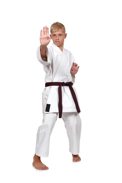 Chlapec v karate vyhovovat školení — Stock fotografie