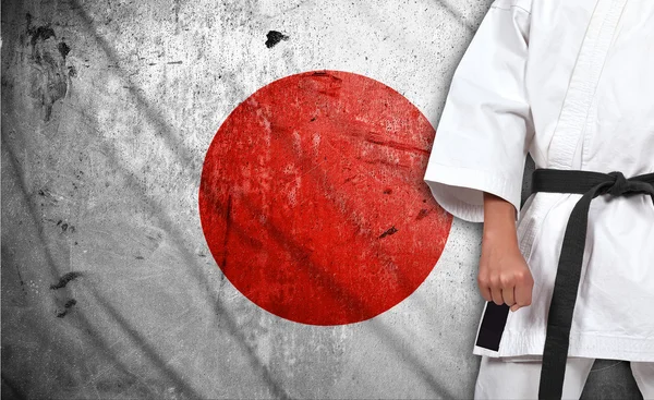 Ragazzo in kimono e bandiera giappone — Foto Stock
