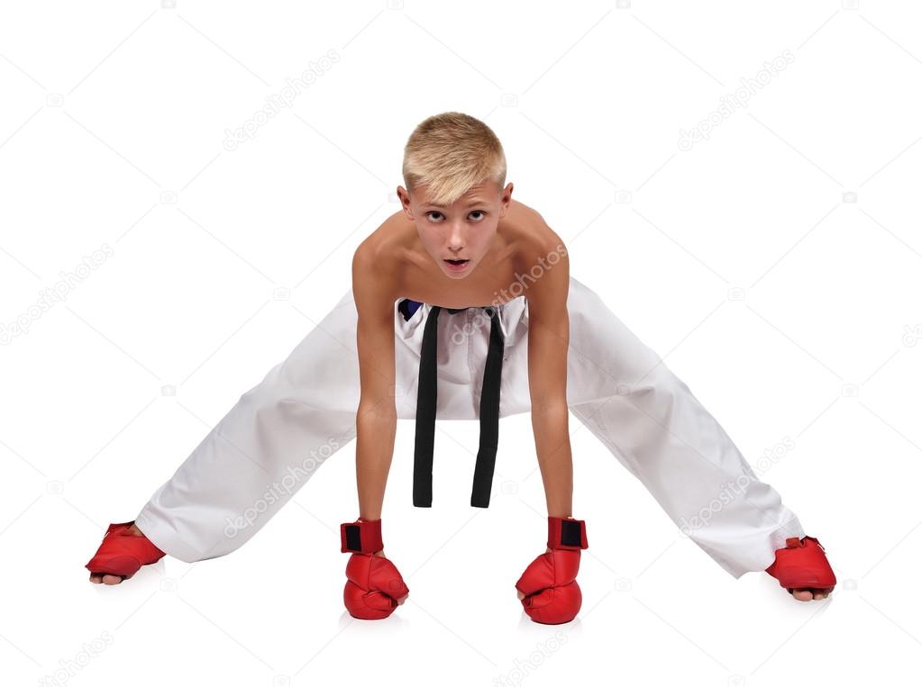 boy in red gloves training karate