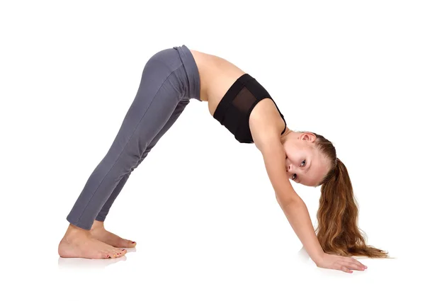 Girl doing yoga exercise — Stock Photo, Image
