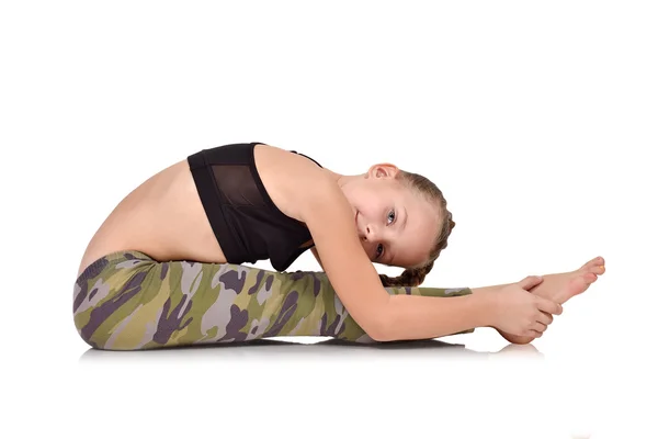 Little girl does exercise, children's yoga — Stock Photo, Image