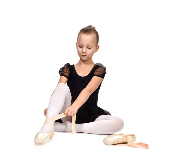 Ballerina wears ballet shoes — Stock Photo, Image