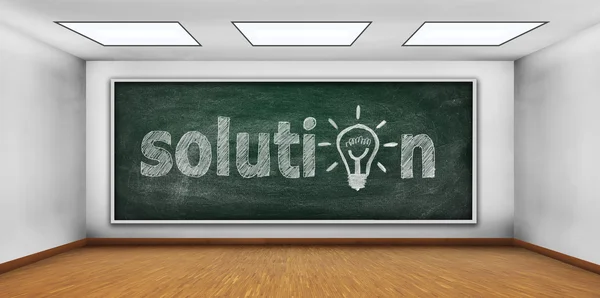 Drawing solution symbol on the green chalkboard — Stock Photo, Image