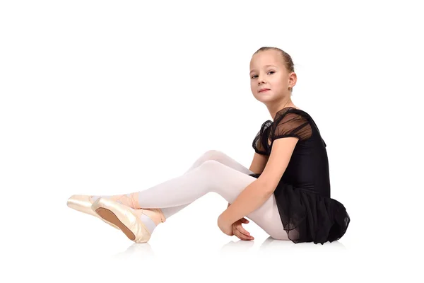 Meisje ballerina zittend op de vloer — Stockfoto