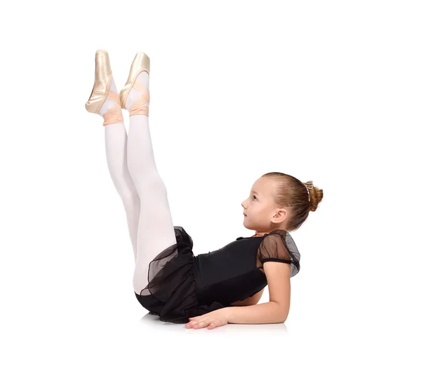 Lilla ballerina sitter på golvet — Stockfoto