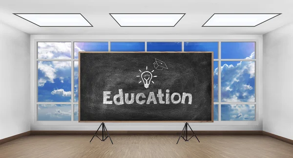 Chalk board with drawing education concept in white room — Stock Photo, Image