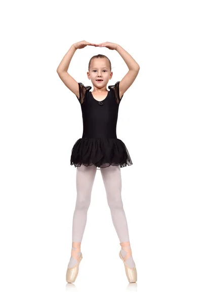Kleine Ballerina tanzt auf weißem Hintergrund — Stockfoto