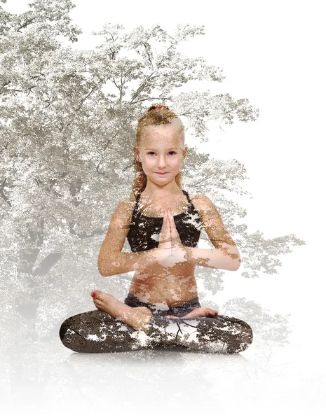 Girl sitting lotus position — Stock Photo, Image