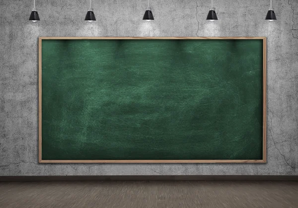 Blank blackboard on concrete wall in loft room — Stock Photo, Image