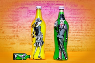 Modern art - hand-painted bottle colors. Girl with a dog and a man in a suit and with a bouquet of flowers. Photo in the art processing