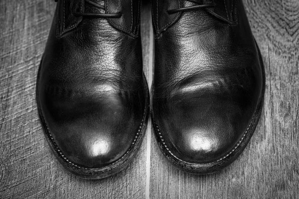 Male leather shoes on wooden background — Stock Photo, Image