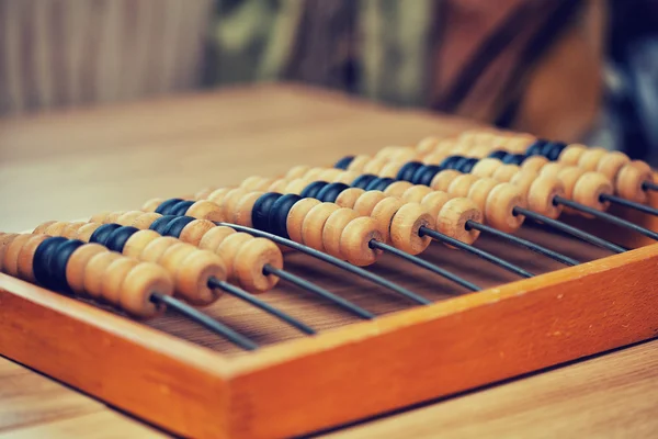 Oude abacus op tafel op de kamer — Stockfoto