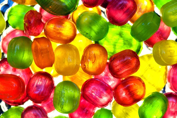 Caramelos transparentes. fondo de caramelos coloridos — Foto de Stock