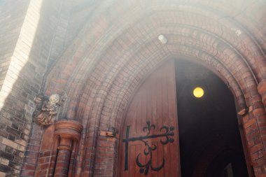 English Gothic, The entrance to the Anglican Church of St. Andrew in Moscow clipart