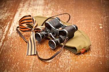 Victory Day on May 9. Military binoculars, field cap, George Ribbon. retro Style. 70 Years of Victory clipart