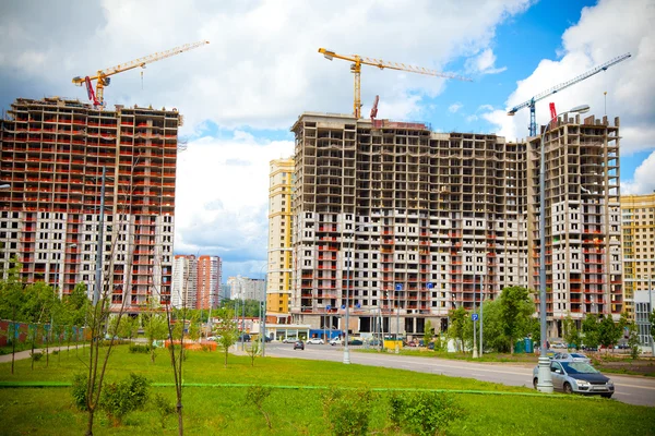 The construction site. Construction of the new building. Construction cranes Stock Image