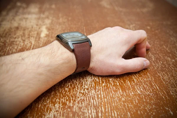 Male hand with clock — Stock Photo, Image