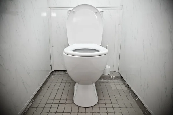 White toilet bowl in a bathroom — Stock Photo, Image