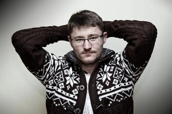 Studio portrait of a young man with glasses — Stock Photo, Image