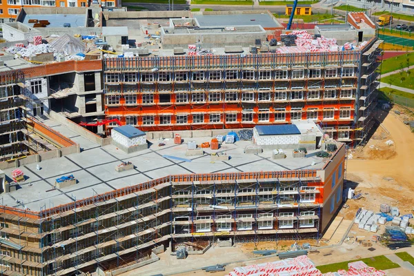 The construction of new buildings at the site. The view from the top — Stock Photo, Image