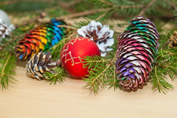 Christmas decoration, Christmas tree. Beautiful colorful Christmas tree cones — Stock Photo, Image