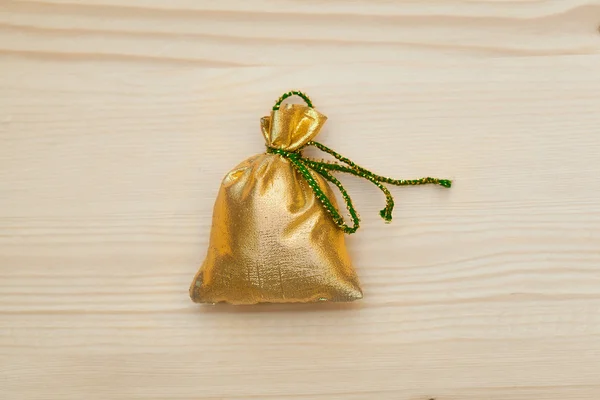 Boże Narodzenie worek z prezentów na drewniane tła — Zdjęcie stockowe