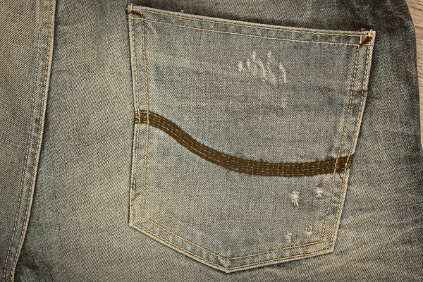 The back pocket of his jeans. Vintage style — Stock Photo, Image