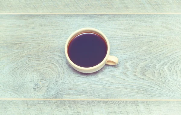 Coffee Mug on Wooden Table. Vintage style, top view — Stock Photo, Image