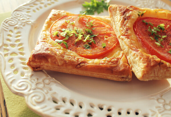 puff pastry with tomatoes, cheese and herbs