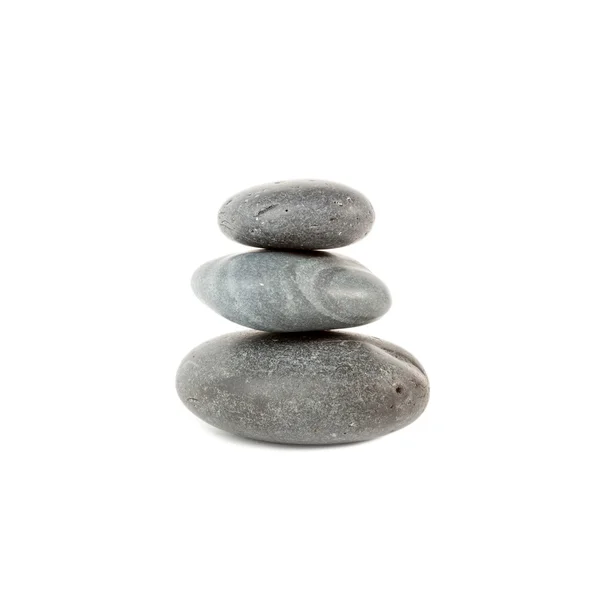 Trzy kamienie gładkie na siebie na białym tle nad białym — Zdjęcie stockowe